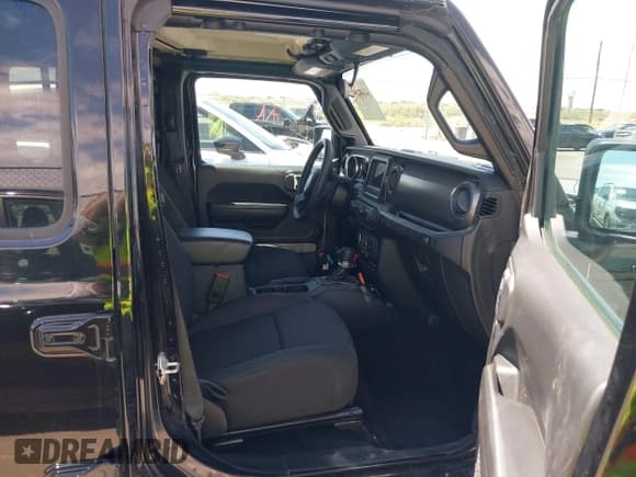 ✅ 2023 Jeep Wrangler • VIN: 1C4JJXN65PW628974 • Lot: 42867075. Wystawiony na IAAI z przebiegiem 62 357 mil. Bezpłatny archiwum sprzedaży aukcyjnych z USA i szczegółowy raport historii pojazdu na DreamBid. Zdjęcie 5.