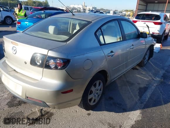 ✅ 2007 Mazda 3 i Sport • VIN: JM1BK12F771656243 • Lot: 43323460. Listed on IAAI with 167,515 mi. Free auction sales archive from the USA and detailed vehicle history report at DreamBid. Image 4.
