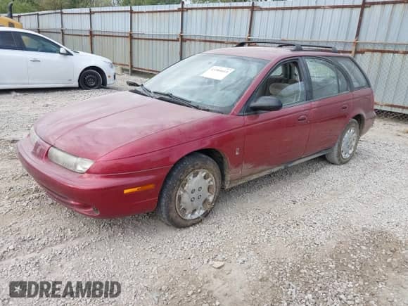 1996 Saturn SW z VIN 1G8ZJ8272TZ346249, wystawiony jako IAAI lot #43384611 z przebiegiem 182 853 mil mil oraz . Historia ofert i sprzedaży dostępna na DreamBid. Obrazek 17.
