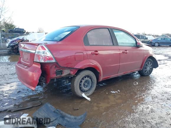 2011 Chevrolet Aveo 1LT z VIN KL1TD5DE5BB134392, wystawiony jako IAAI lot #41352555 z przebiegiem 153 160 mil mil oraz . Historia ofert i sprzedaży dostępna na DreamBid. Obrazek 4.