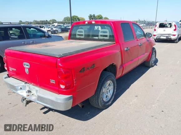 ✅ 2005 Dodge Dakota SLT • VIN: 1D7HW48N05S250364 • Лот: 43319038. Опубликован ранее на IAAI с пробегом 106 385 миль. Бесплатный доступ к архиву аукционных продаж из США и подробный отчёт об истории автомобиля на DreamBid. Изображение 4.