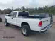 2002 Dodge Dakota Sport z VIN 1B7GL32X22S508401, wystawiony jako IAAI lot #41591465 z przebiegiem Nie podano mil oraz . Historia ofert i sprzedaży dostępna na DreamBid. Obrazek 3.