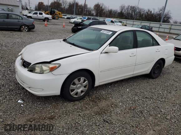 ✅ 2002 Toyota Camry LE • VIN: JTDBE32K220136952 • Лот: 93010485. Опубликован ранее на Copart с пробегом 214 216 миль. Бесплатный доступ к архиву аукционных продаж из США и подробный отчёт об истории автомобиля на DreamBid. Изображение 1.