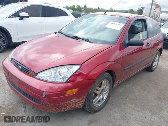 ✅ 2003 Ford Focus ZX3 • VIN: 3FAFP31Z23R187918 • Lot: 41969325. Listed on IAAI with Not provided. Free auction sales archive from the USA and detailed vehicle history report at DreamBid. Image 2.