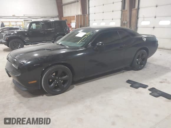 ✅ 2013 Dodge Challenger SXT • VIN: 2C3CDYAG6DH632762 • Lot: 42319731. Listed on IAAI with 140,667 mi. Free auction sales archive from the USA and detailed vehicle history report at DreamBid. Image 2.