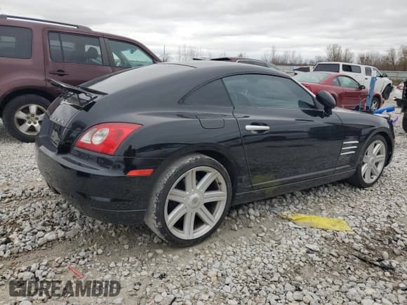 ✅ 2004 Chrysler Crossfire • VIN: 1C3AN69L74X002206 • Lot: 79107444. Listed on Copart with 99,937 mi. Free auction sales archive from the USA and detailed vehicle history report at DreamBid. Image 3.