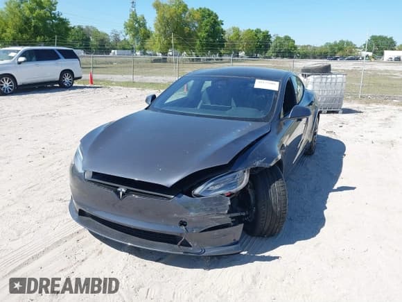 ✅ 2021 Tesla Model S Plaid • VIN: 5YJSA1E61MF435321 • Lot: 41832006. Listed on IAAI with 23,361 mi. Free auction sales archive from the USA and detailed vehicle history report at DreamBid. Image 6.
