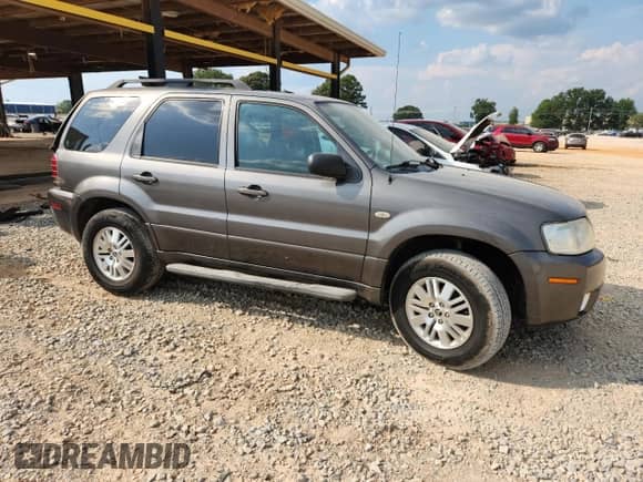 2005 Mercury Mariner Luxury z VIN 4M2YU56145DJ30667, wystawiony jako Copart lot #80196845 z przebiegiem 336 063 mil mil oraz Szkoda całkowita • Salvage title. Historia ofert i sprzedaży dostępna na DreamBid. Obrazek 4.