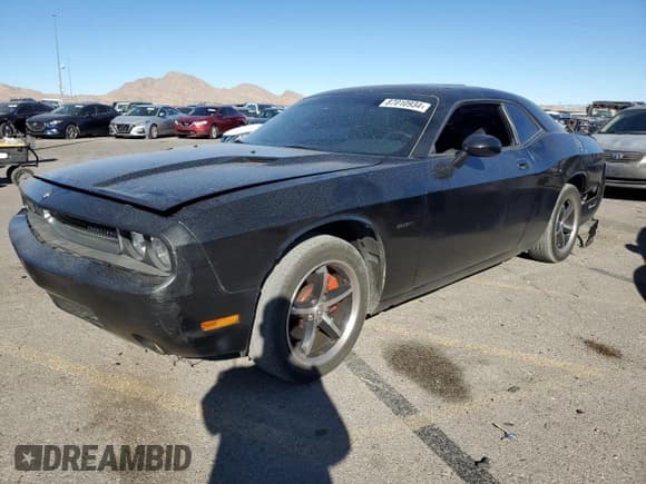 ✅ 2010 Dodge Challenger SE • VIN: 2B3CJ4DV1AH103496 • Lot: 87010934. Wystawiony na Copart z przebiegiem 190 016 mil. Bezpłatny archiwum sprzedaży aukcyjnych z USA i szczegółowy raport historii pojazdu na DreamBid. Zdjęcie 1.