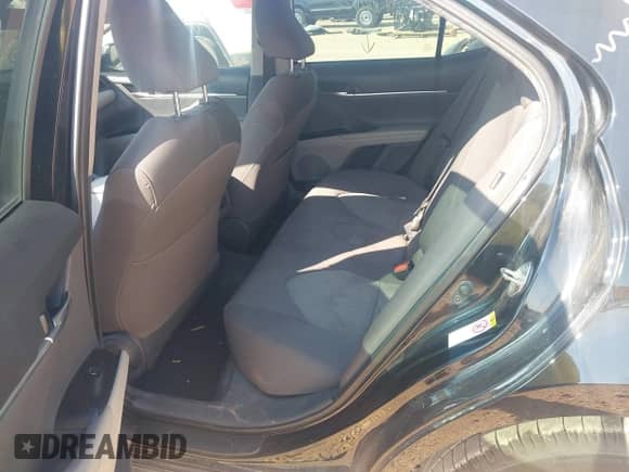 2019 Toyota Camry LE z VIN 4T1B11HK9KU725556, wystawiony jako IAAI lot #42922588 z przebiegiem 138 969 mil mil oraz . Historia ofert i sprzedaży dostępna na DreamBid. Obrazek 8.