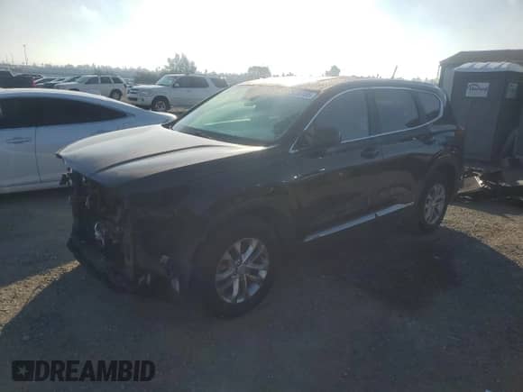 2019 Hyundai Santa Fe SE with VIN 5NMS2CAD2KH008660, listed as a Copart auction lot 89726155 with 76,060 mi miles and Salvage title. Bid and sale history available at DreamBid. Image 1.