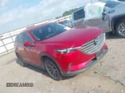 ✅ 2016 Mazda CX-9 Touring • VIN: JM3TCACY7G0116986 • Lot: 42140423. Listed on IAAI with 135,442 mi. Free auction sales archive from the USA and detailed vehicle history report at DreamBid. Image 1.