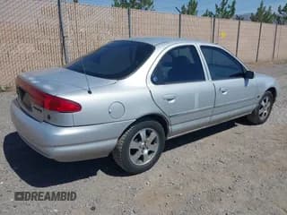 ✅ 2000 Mercury Mystique • VIN: 1MEFM66L9YK608858 • Лот: 42568301. Опубликован ранее на IAAI с пробегом 110 744 миль. Бесплатный доступ к архиву аукционных продаж из США и подробный отчёт об истории автомобиля на DreamBid. Изображение 4.