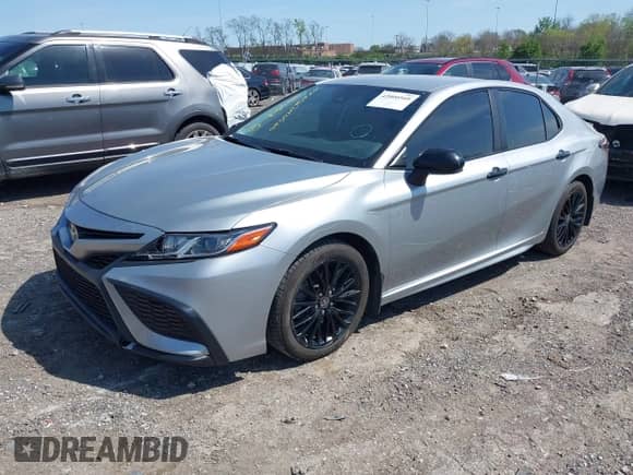 2021 Toyota Camry SE with VIN 4T1G11BK3MU026604, listed as a IAAI auction lot 42000560 with 104,453 mi miles and . Bid and sale history available at DreamBid. Image 2.