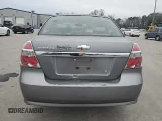 2007 Chevrolet Aveo LS z VIN KL1TD56637B061892, wystawiony jako Copart lot #86140044 z przebiegiem Nie podano mil oraz Szkoda całkowita • Salvage title. Historia ofert i sprzedaży dostępna na DreamBid. Obrazek 6.