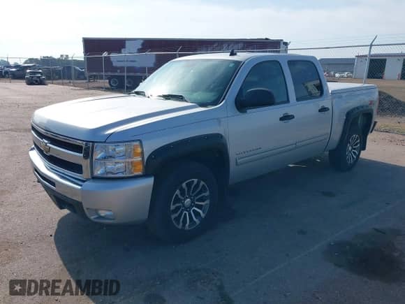 2011 Chevrolet Silverado 1500 LT with VIN 3GCPKSE38BG219794, listed as a IAAI auction lot 42793119 with 131,453 mi miles and . Bid and sale history available at DreamBid. Image 17.