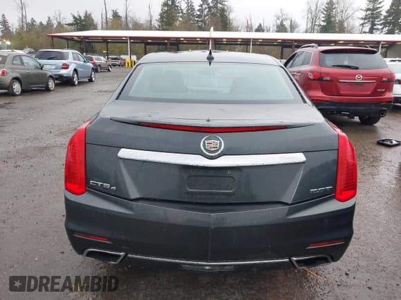 ✅ 2014 Cadillac CTS Performance AWD • VIN: 1G6AY5SX4E0128787 • Lot: 43787572. Listed on IAAI with 123,201 mi. Free auction sales archive from the USA and detailed vehicle history report at DreamBid. Image 17.