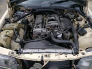 ✅ 1985 Mercedes-Benz 190 • VIN: WDBDB22C5FF084867 • Lot: 71371744. Listed on Copart with 171,046 mi. Free auction sales archive from the USA and detailed vehicle history report at DreamBid. Image 11.