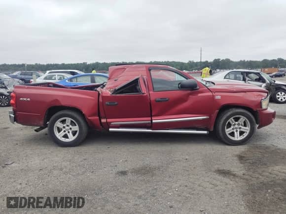 2010 Dodge Dakota Laramie z VIN 1D7CW5GP3AS156914, wystawiony jako IAAI lot #42569804 z przebiegiem 198 463 mil mil oraz . Historia ofert i sprzedaży dostępna na DreamBid. Obrazek 12.