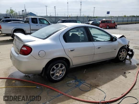 2005 Dodge Neon SXT z VIN 1B3ES56CX5D142131, wystawiony jako Copart lot #54055695 z przebiegiem 82 984 mil mil oraz Nie do naprawy • Non repairable. Historia ofert i sprzedaży dostępna na DreamBid. Obrazek 3.