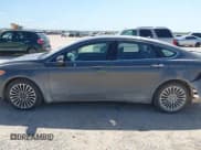 ✅ 2018 Ford Fusion Titanium • VIN: 3FA6P0D90JR188640 • Lot: 42555223. Listed on IAAI with 155,327 mi. Free auction sales archive from the USA and detailed vehicle history report at DreamBid. Image 14.