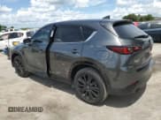✅ 2022 Mazda CX-5 2.5 Turbo • VIN: JM3KFBAY6N0607767 • Лот: 71276325. Опубликован ранее на Copart с пробегом 63 133 миль. Бесплатный доступ к архиву аукционных продаж из США и подробный отчёт об истории автомобиля на DreamBid. Изображение 2.