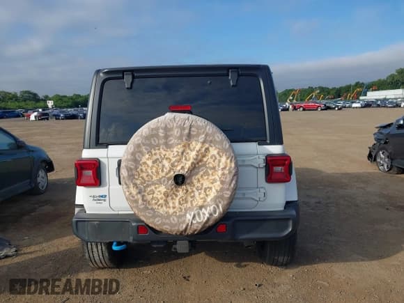 ✅ 2023 Jeep Wrangler Sahara • VIN: 1C4JJXP65PW555618 • Lot: 43005963. Listed on IAAI with 29,146 mi. Free auction sales archive from the USA and detailed vehicle history report at DreamBid. Image 16.