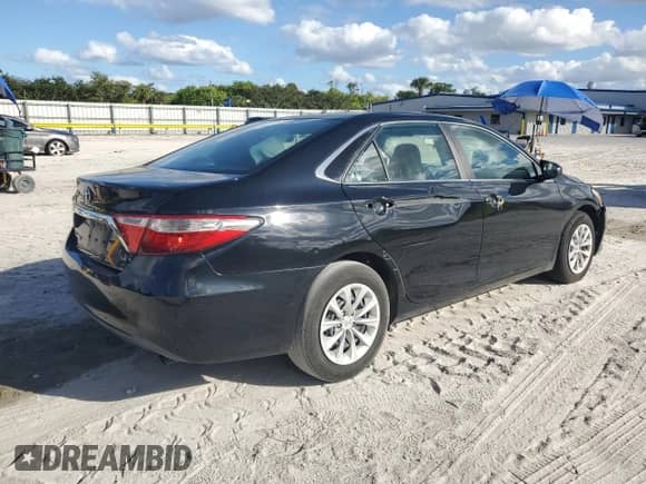 2016 Toyota Camry SE with VIN 4T1BF1FKXGU574836, listed as a Copart auction lot 82604945 with 93,140 mi miles and Salvage title. Bid and sale history available at DreamBid. Image 3.