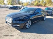 ✅ 2016 Jaguar XJ Portfolio • VIN: SAJWJ2GD1G8W00339 • Lot: 43642626. Listed on IAAI with 100,482 mi. Free auction sales archive from the USA and detailed vehicle history report at DreamBid. Image 2.