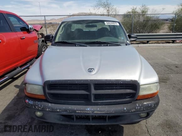 ✅ 2004 Dodge Dakota SLT • VIN: 1D7HL48N04S780843 • Lot: 58639825. Wystawiony na Copart z przebiegiem 166 188 mil. Bezpłatny archiwum sprzedaży aukcyjnych z USA i szczegółowy raport historii pojazdu na DreamBid. Zdjęcie 5.