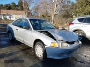 ✅ 2001 Mitsubishi Mirage DE • VIN: JA3AY11A91U038362 • Lot: 41363633. Listed on IAAI with 327,214 mi. Free auction sales archive from the USA and detailed vehicle history report at DreamBid. Image 1.