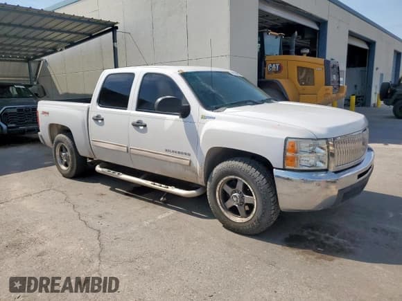 ✅ 2012 Chevrolet Silverado 1500 1HY • VIN: 3GCUKUEJ5CG298047 • Lot: 68750835. Listed on Copart with 148,392 mi. Free auction sales archive from the USA and detailed vehicle history report at DreamBid. Image 4.