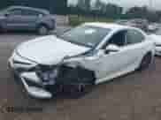 2021 Toyota Camry SE with VIN 4T1G11BK6MU025267, listed as a IAAI auction lot 42648821 with 113,931 mi miles and . Bid and sale history available at DreamBid. Image 2.