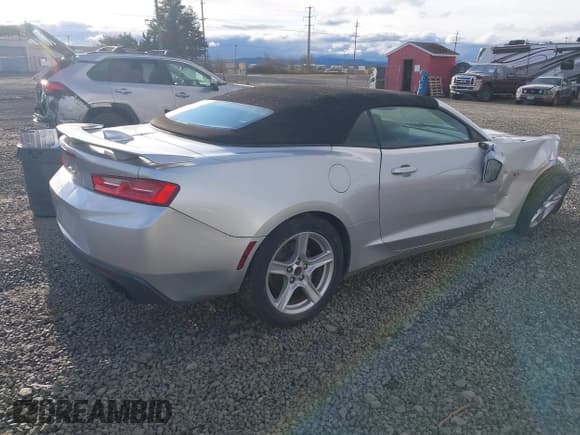 ✅ 2018 Chevrolet Camaro 1LT • VIN: 1G1FB3DX6J0126838 • Lot: 41682004. Listed on IAAI with 65,957 mi. Free auction sales archive from the USA and detailed vehicle history report at DreamBid. Image 4.