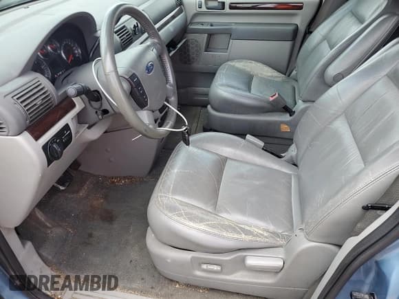 ✅ 2007 Ford Freestar SEL • VIN: 2FMZA52227BA04751 • Lot: 60980015. Listed on Copart with 233,179 mi. Free auction sales archive from the USA and detailed vehicle history report at DreamBid. Image 7.