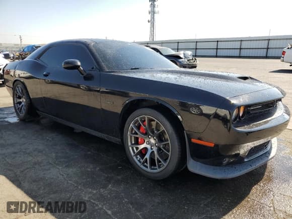 ✅ 2016 Dodge Challenger SRT 392 • VIN: 2C3CDZDJ5GH255570 • Lot: 66211604. Wystawiony na Copart z przebiegiem Nie podano. Bezpłatny archiwum sprzedaży aukcyjnych z USA i szczegółowy raport historii pojazdu na DreamBid. Zdjęcie 4.