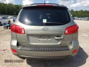 ✅ 2009 Hyundai Santa Fe Limited • VIN: 5NMSH13E99H240885 • Lot: 72333614. Listed on Copart with 218,784 mi. Free auction sales archive from the USA and detailed vehicle history report at DreamBid. Image 6.