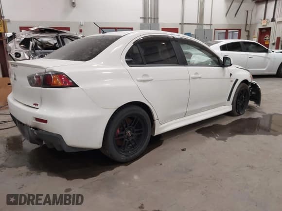 ✅ 2013 Mitsubishi Lancer Evolution MR • VIN: JA32W5FV0DU010032 • Lot: 42592361. Wystawiony na IAAI z przebiegiem 133 344 mil. Bezpłatny archiwum sprzedaży aukcyjnych z USA i szczegółowy raport historii pojazdu na DreamBid. Zdjęcie 4.