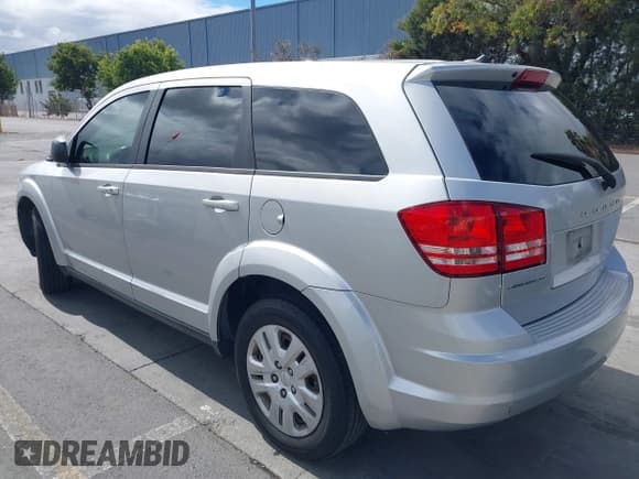 ✅ 2014 Dodge Journey SE • VIN: 3C4PDCAB8ET173778 • Lot: 43189104. Listed on IAAI with 160,180 mi. Free auction sales archive from the USA and detailed vehicle history report at DreamBid. Image 3.