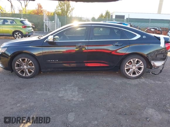 ✅ 2015 Chevrolet Impala LT • VIN: 2G1125S30F9127650 • Lot: 43607481. Listed on IAAI with 129,038 mi. Free auction sales archive from the USA and detailed vehicle history report at DreamBid. Image 14.