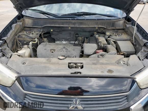 2016 Mitsubishi Outlander SE z VIN JA4AP3AW1GZ030192, wystawiony jako Copart lot #64548835 z przebiegiem 126 616 mil mil oraz Szkoda całkowita • Salvage title. Historia ofert i sprzedaży dostępna na DreamBid. Obrazek 12.