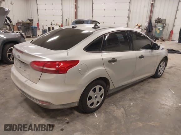 ✅ 2018 Ford Focus S • VIN: 1FADP3E21JL307434 • Lot: 43579599. Listed on IAAI with 106,062 mi. Free auction sales archive from the USA and detailed vehicle history report at DreamBid. Image 4.
