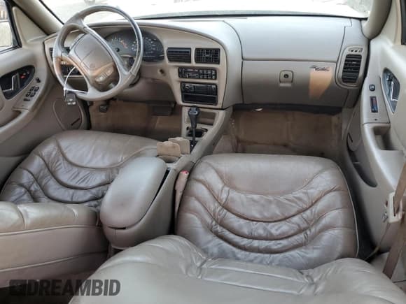 ✅ 1996 Buick Regal Custom • VIN: 2G4WB52K5T1517380 • Lot: 83106314. Listed on Copart with 112,411 mi. Free auction sales archive from the USA and detailed vehicle history report at DreamBid. Image 8.