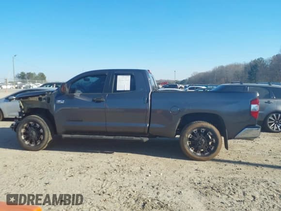 ✅ 2015 Toyota Tundra SR5 • VIN: 5TFRY5F16FX185510 • Лот: 41706192. Опубликован ранее на IAAI с пробегом 97 162 миль. Бесплатный доступ к архиву аукционных продаж из США и подробный отчёт об истории автомобиля на DreamBid. Изображение 14.