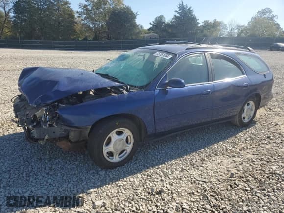 ✅ 1997 Ford Taurus GL • VIN: 1FALP57U2VA153212 • Lot: 75761034. Listed on Copart with 167,802 mi. Free auction sales archive from the USA and detailed vehicle history report at DreamBid. Image 1.