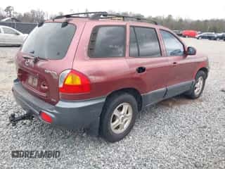 2002 Hyundai Santa Fe GLS z VIN KM8SC73D72U306997, wystawiony jako IAAI lot #41519773 z przebiegiem 244 398 mil mil oraz . Historia ofert i sprzedaży dostępna na DreamBid. Obrazek 4.