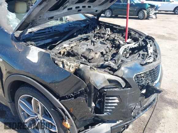 ✅ 2022 Cadillac XT4 FWD Sport • VIN: 1GYFZER45NF169304 • Lot: 43589404. Listed on IAAI with Not provided. Free auction sales archive from the USA and detailed vehicle history report at DreamBid. Image 6.