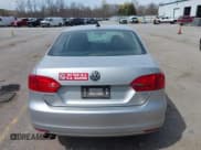 ✅ 2014 Volkswagen Jetta TDI w/Premium/Nav • VIN: 3VWLL7AJ3EM332617 • Lot: 42033000. Listed on IAAI with 186,444 mi. Free auction sales archive from the USA and detailed vehicle history report at DreamBid. Image 16.