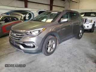 ✅ 2017 Hyundai Santa Fe 2.4L • VIN: 5NMZUDLB6HH048811 • Лот: 60130573. Опубликован ранее на Copart с пробегом 70 018 миль. Бесплатный доступ к архиву аукционных продаж из США и подробный отчёт об истории автомобиля на DreamBid. Изображение 1.