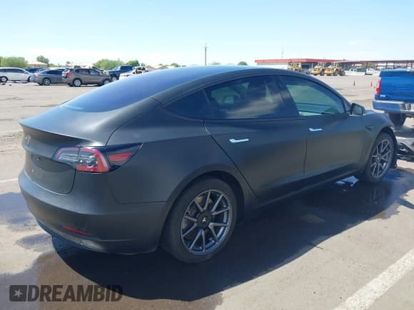✅ 2018 Tesla Model 3 Long Range Battery • VIN: 5YJ3E1EA4JF021040 • Lot: 42966467. Listed on IAAI with 102,787 mi. Free auction sales archive from the USA and detailed vehicle history report at DreamBid. Image 4.